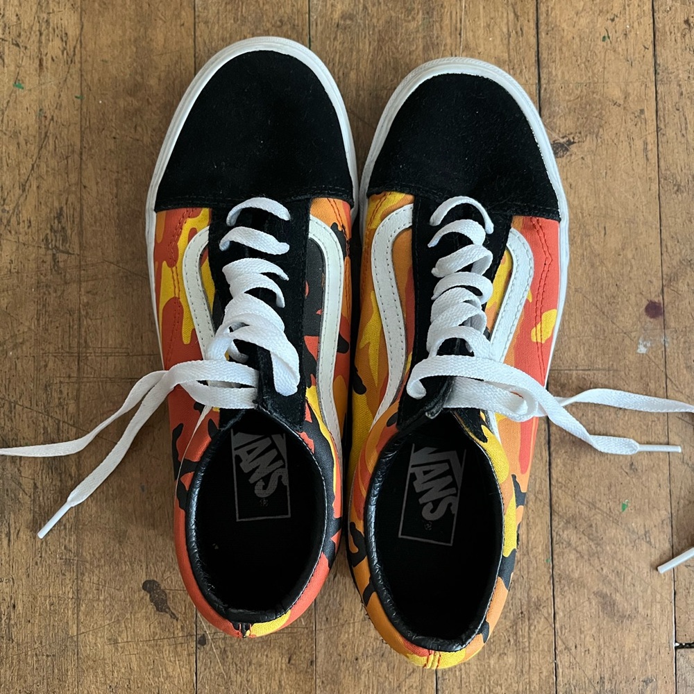 Red and orange camo Vans